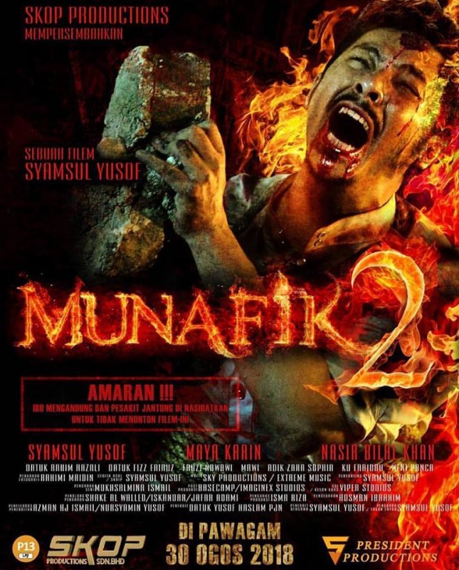 Affiche du film Munafik 2 () de Syamsul Yusof. Voir Munafik 2 en streaming / torrent sur meilleurs-films.fr